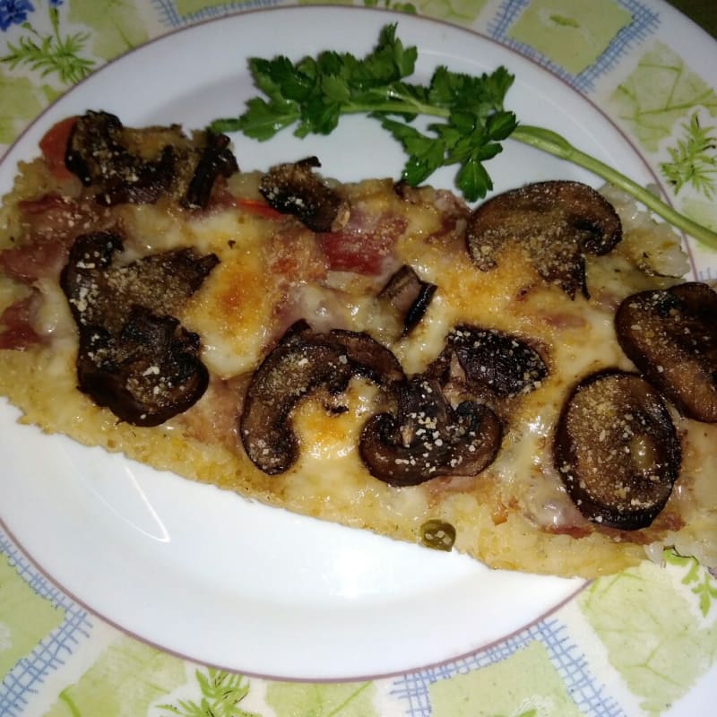 Rice pizza with mushrooms