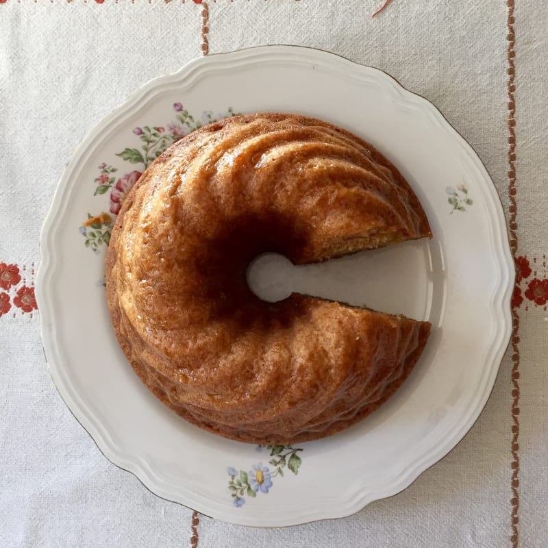 Whole donut with maple syrup and muscovado sugar