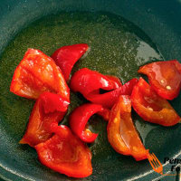 Foto preparazione Sausage with potatoes and peppers Foto preparazione Sausage with potatoes and peppers