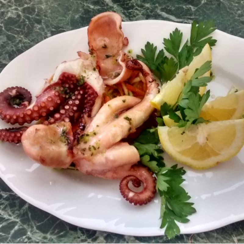 Foto Ricetta Octopus roasted in the oven Foto Ricetta Octopus roasted in the oven