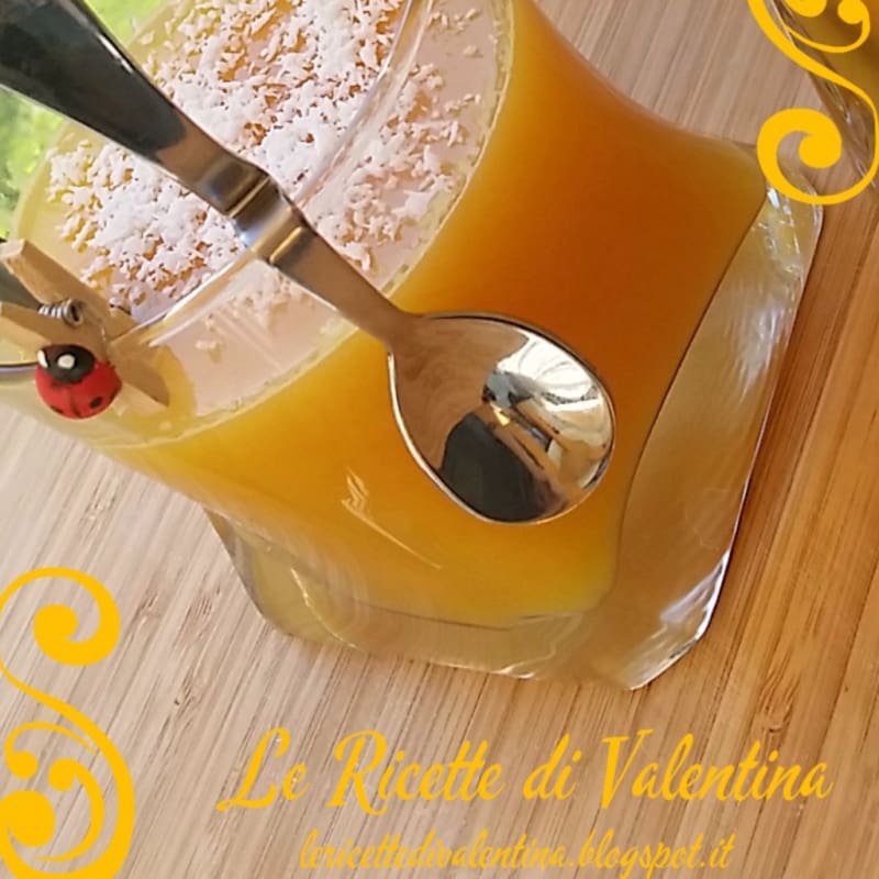 Foto Ricetta Orange juice with a spoon Foto Ricetta Orange juice with a spoon