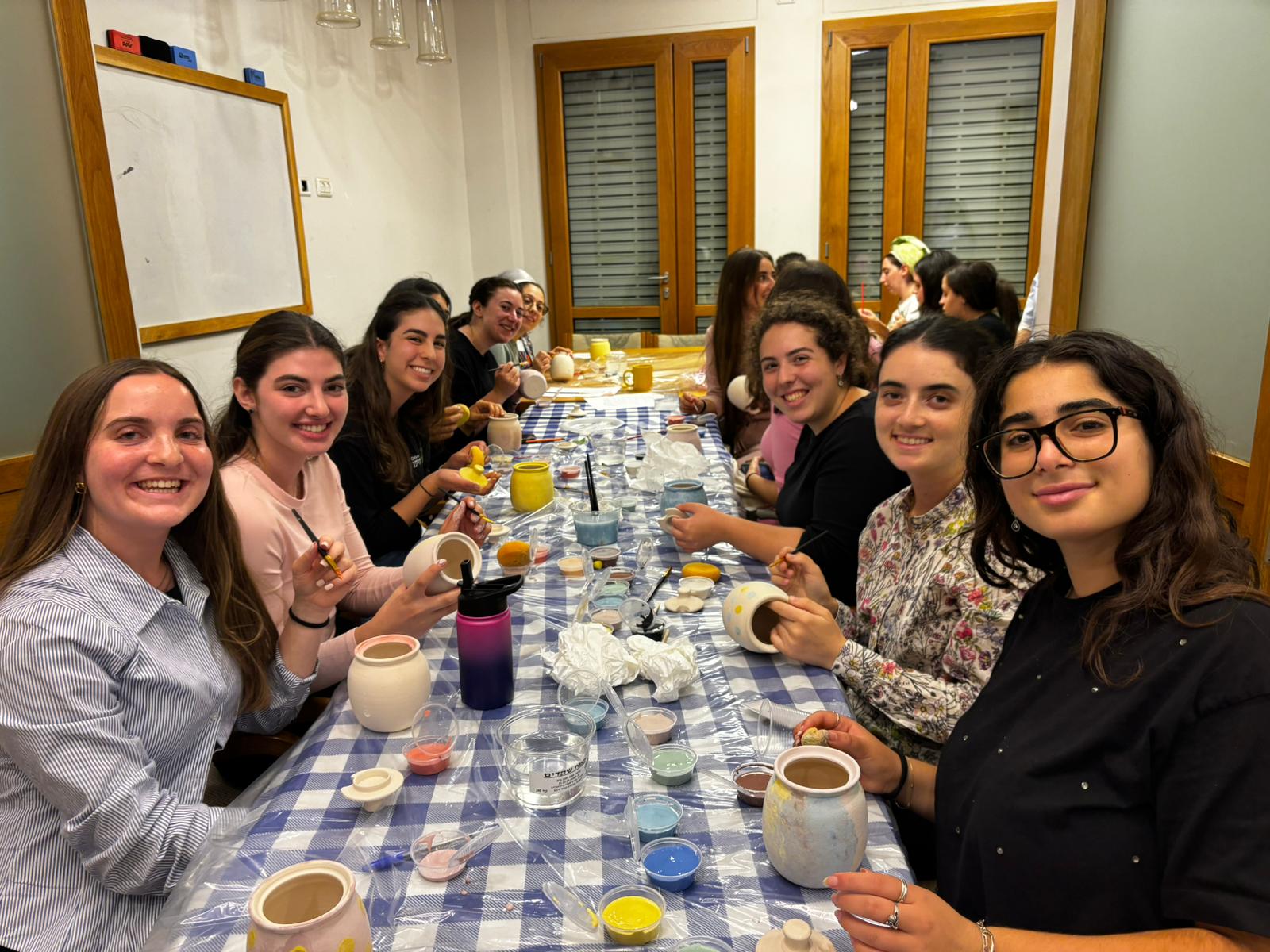 Girls lighting candles at the Zula (placeholder)