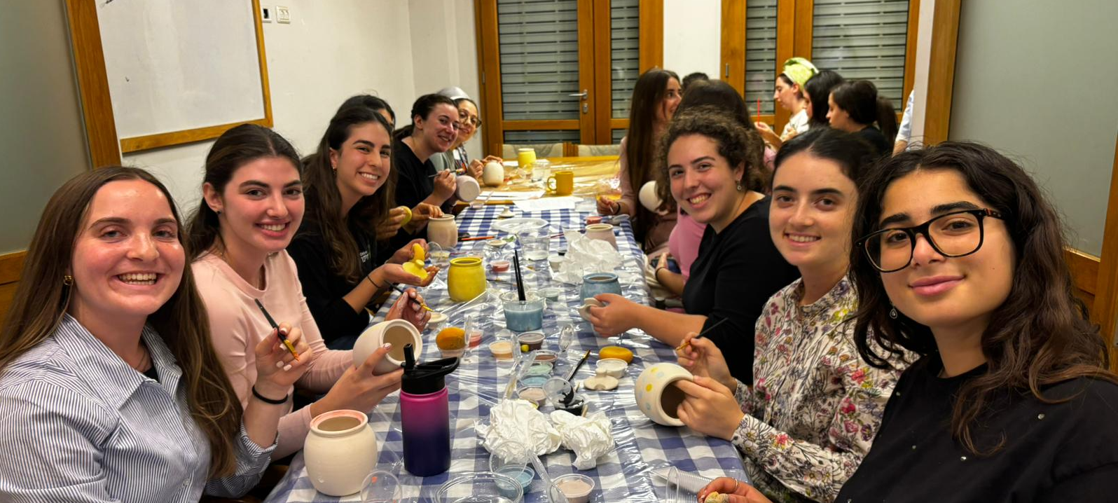 Girls lighting candles at the Zula (placeholder)