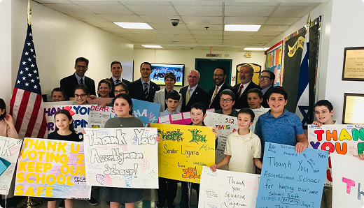 Students with thank you signs