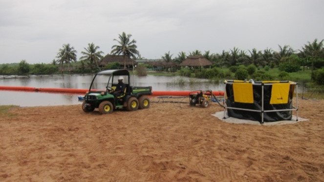 ullow Exercise Wonsom: ATV (all-terrain vehicle) on shoreline, with fast tank set up and boom deployed in 2015.