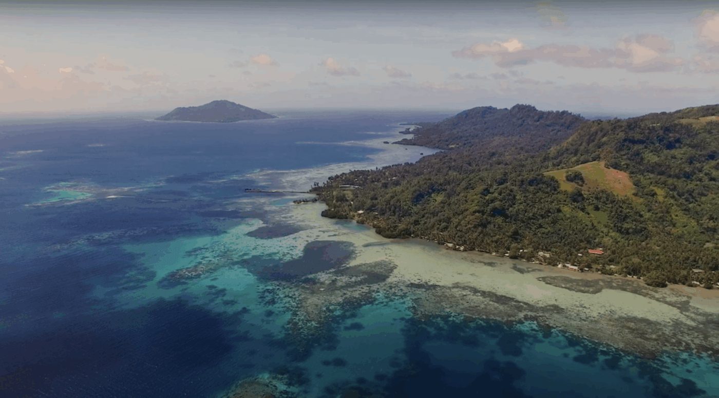 Remote tropical coastline showing sensitive marine habitats at risk from oil pollution.