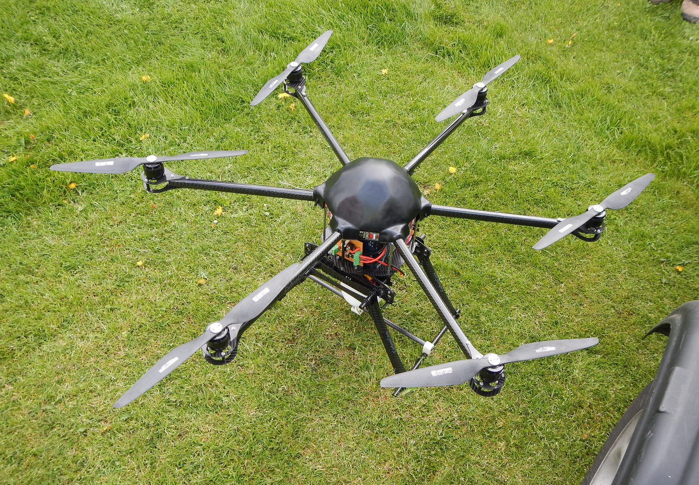 An advanced octocopter UAV designed for aerial surveillance, offering precision mapping and real-time data for oil spill response.