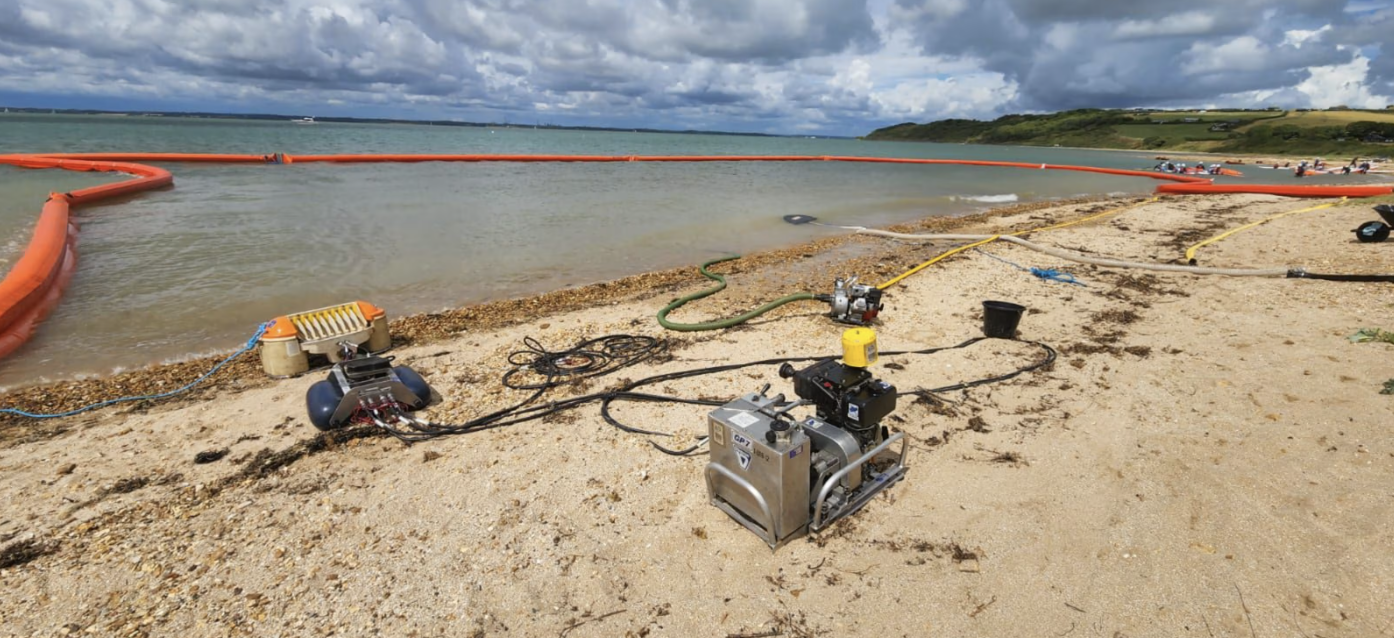 Shoreline boom deployment during endex