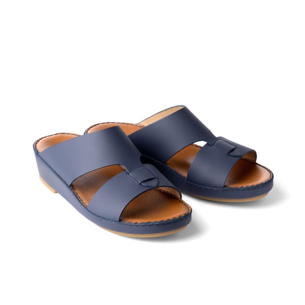 Leather sandals photographed on white for an e-commerce listing.