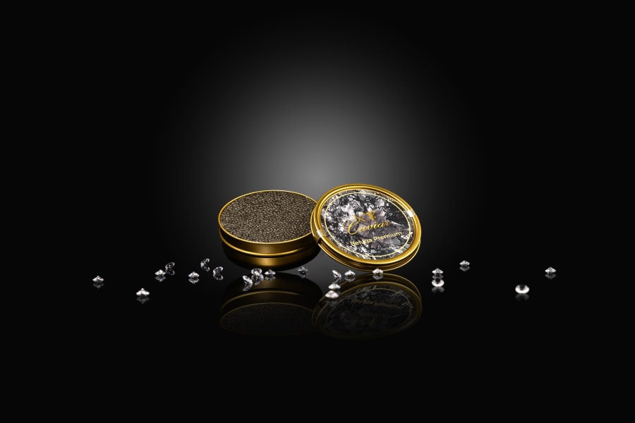 An open gold tin of Beluga caviar on black, surrounded by scattered diamonds.