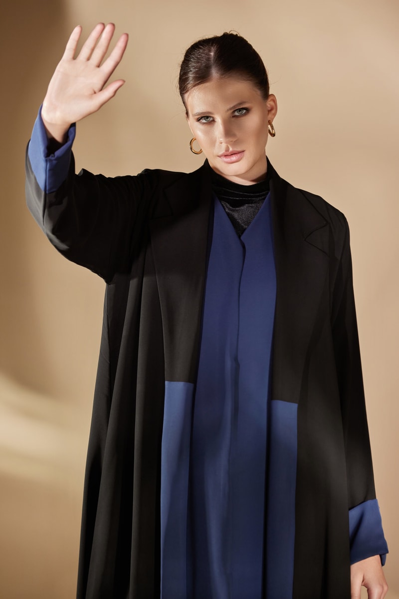 A garment photographed full length on set.