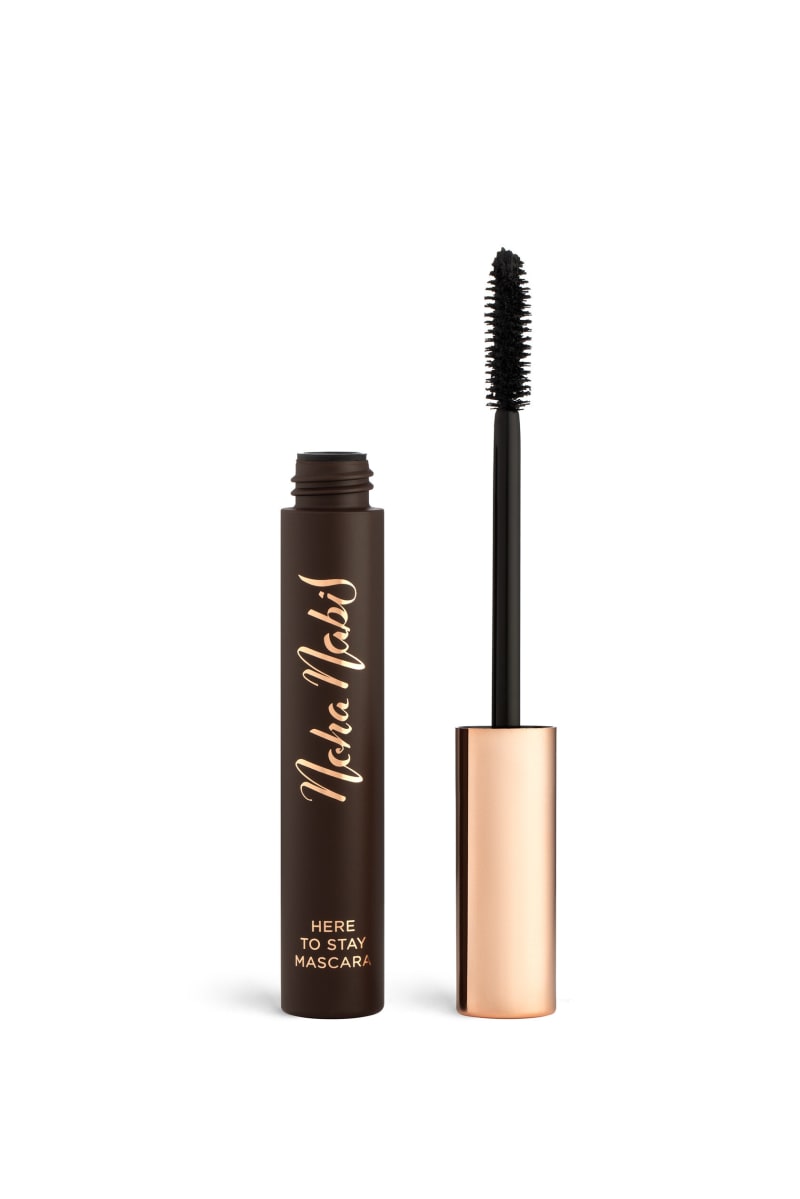 A Noha Nabil mascara with a rose-gold tube photographed on white.