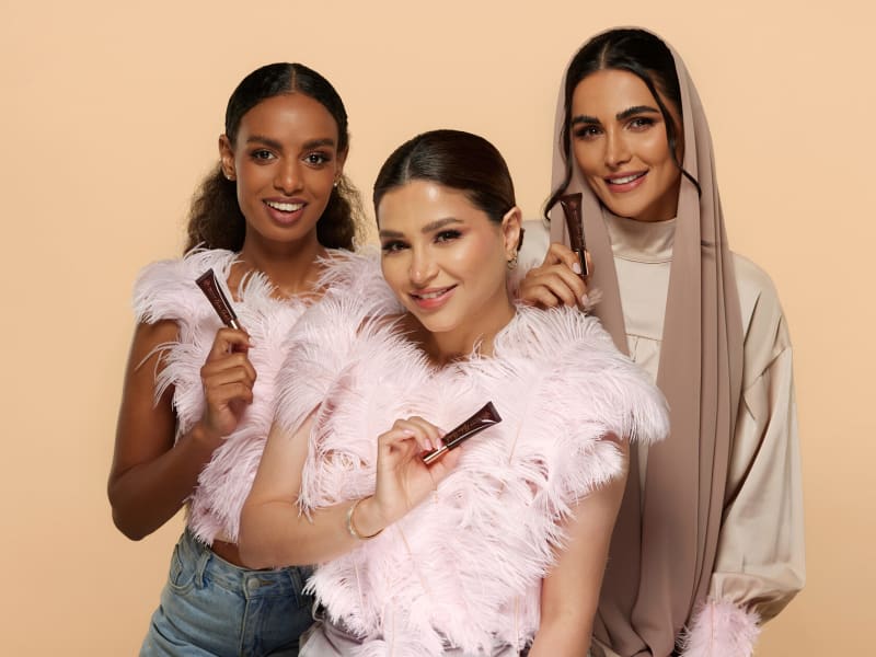 A model mid-pose in a campaign-style frame.