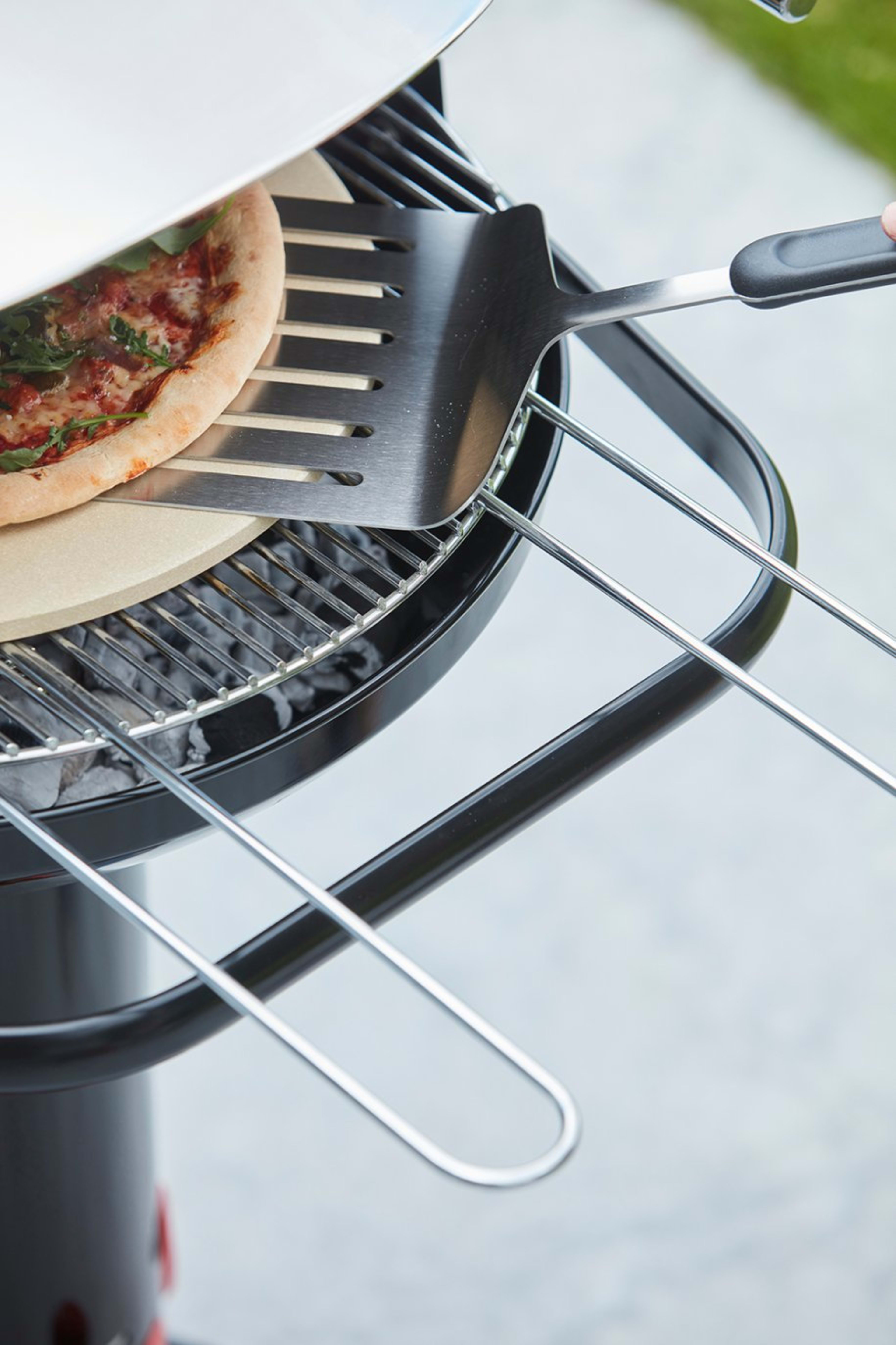 Universal pizza stone made of refractory clay