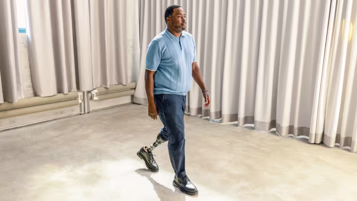 Carlos walks straight ahead with his Taleo Adapt.