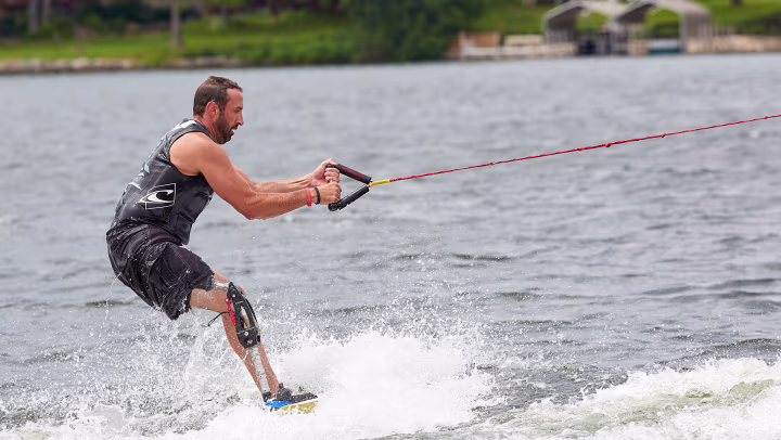Men is wakeboarding with a ProCarve. 