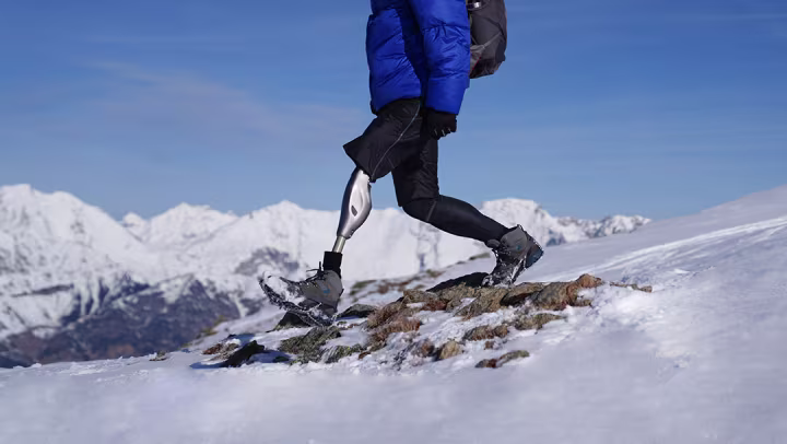 Genium X4 user Björn walking down the hill