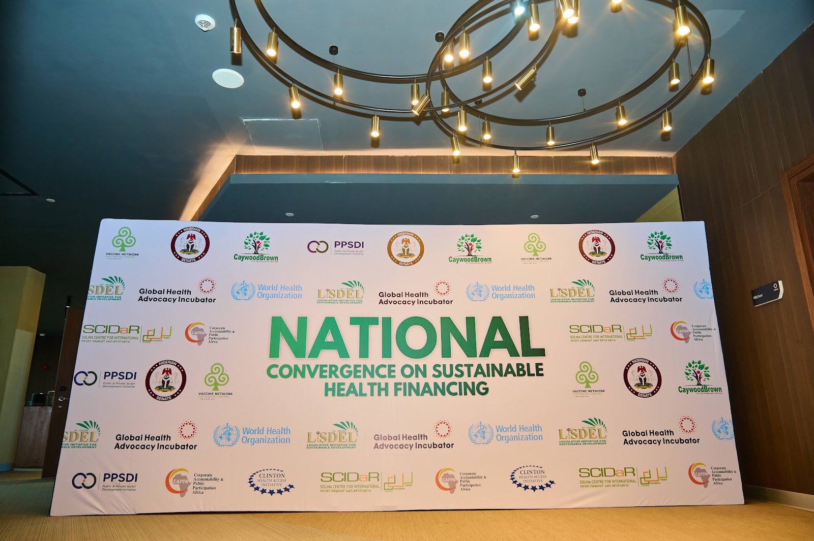 Banquet Hall configuration and branded thematic staging for the landmark national convergence on domestic health financing.