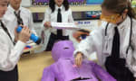 Richmond Hill Montessori Private School - RHMS students perform a heart transplant on a paper alien 