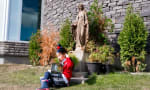 Clear Water Academy - Girl reading in our garden 