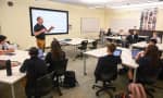 Ashbury College - A teacher provides a lesson in Ashbury College’s Mital Classroom. 