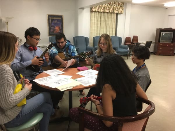 Nancy Campbell Academy - Ukulele fun in residence common area.  