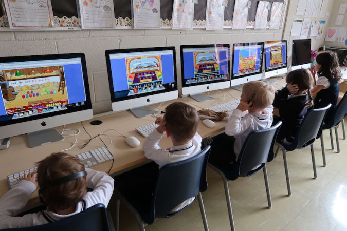 CGS (Children's Garden School) - SK students in the Computer Lab working on their keyboarding skills with Dance Mat Typing. 