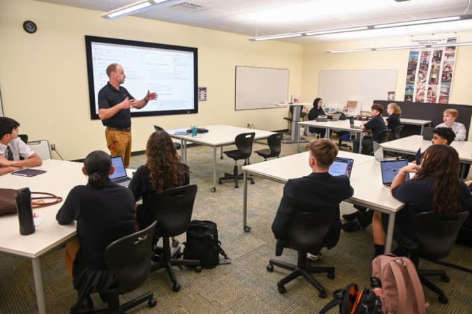 Ashbury College - A teacher provides a lesson in Ashbury College’s Mital Classroom. 