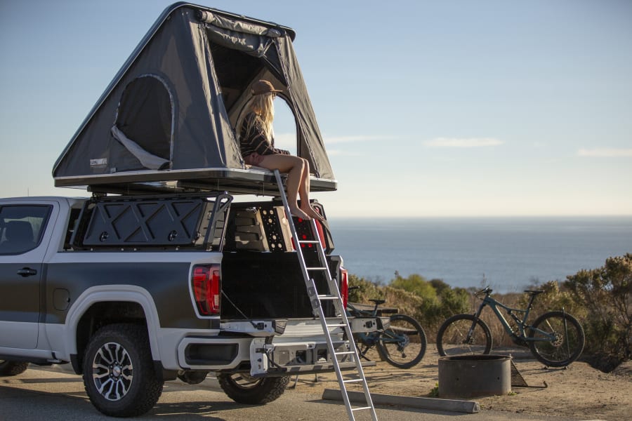 Elevated tent allows for scenic views.  "Kicker Sound System" can be seen in tailgate step!