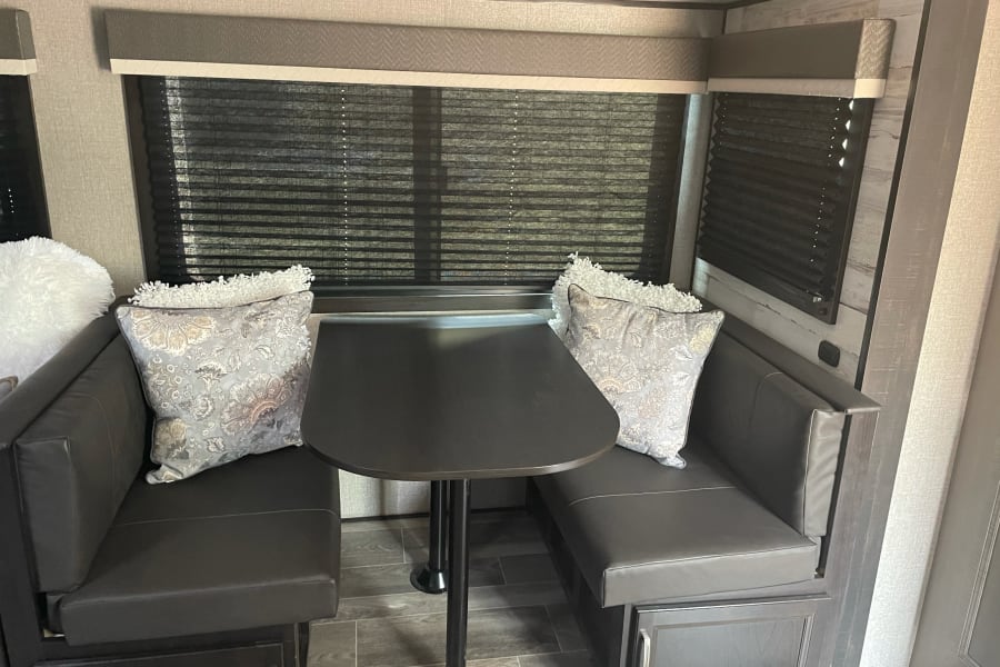 Fold down area for extra sleeping as well as extra storage under each seat!