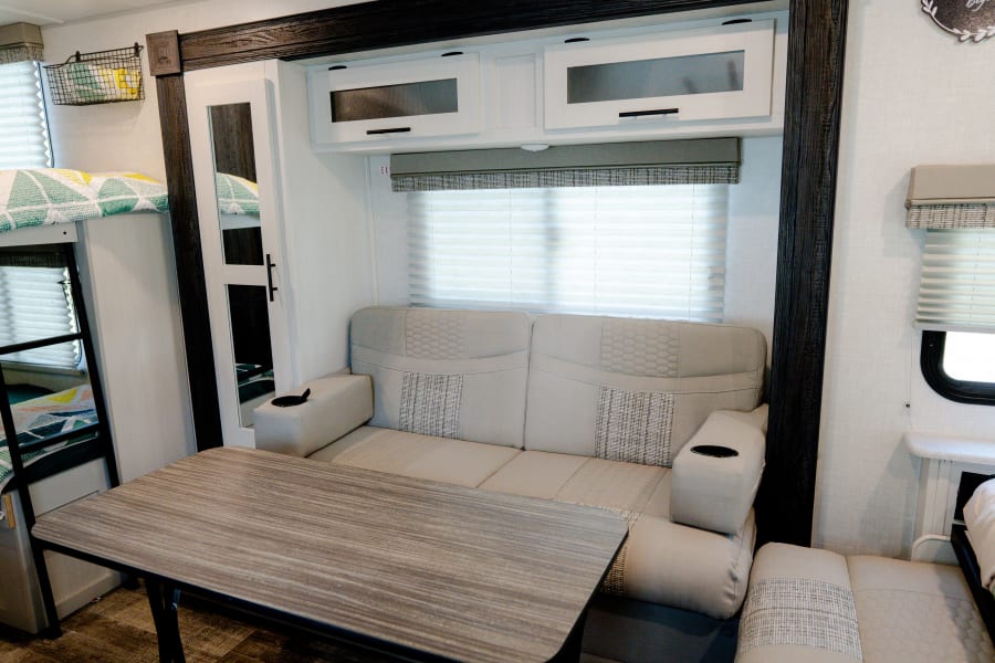 More seating! There is also a 2-seater sofa, that folds down into a small bed (perfect for tiny humans)