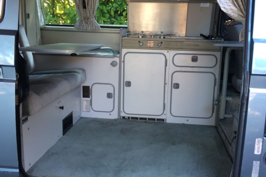 Kitchen with two swivel tables.