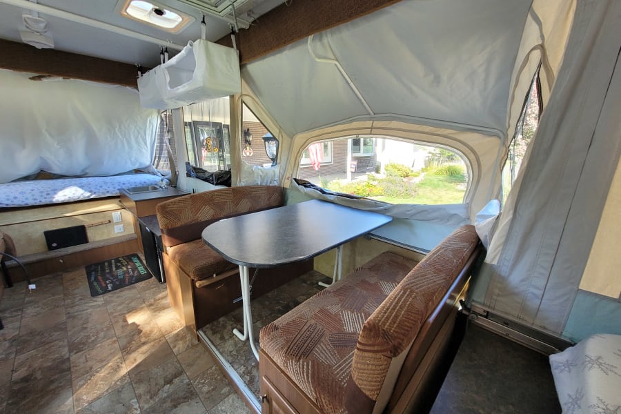 Seats 6 & folds down to additional bed!