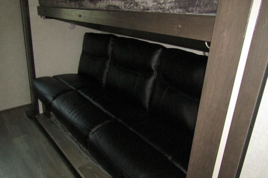 The couch pulls out into another bed