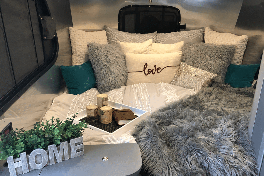 This area conveys to the "living room" with table for eating - we prefer to keep the bed set up and eat outside or right here!