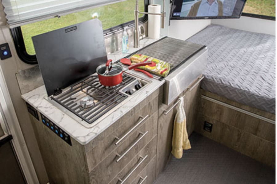 Two burner stove top with kitchen sink