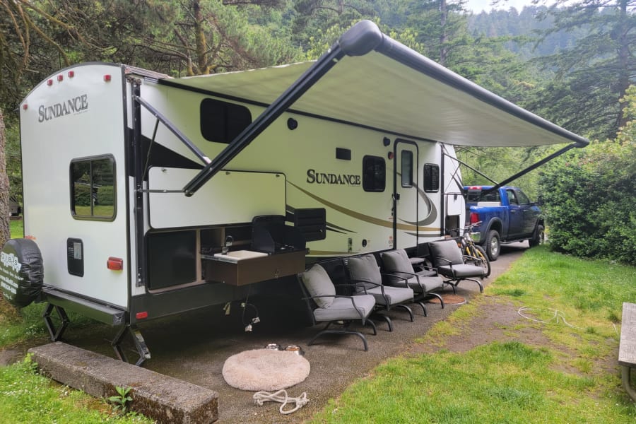 The perfect spot to spend a weekend with the pups cooking on the outdoor kitchen.