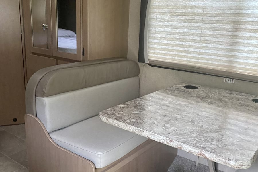 Dining table turns into bed 
