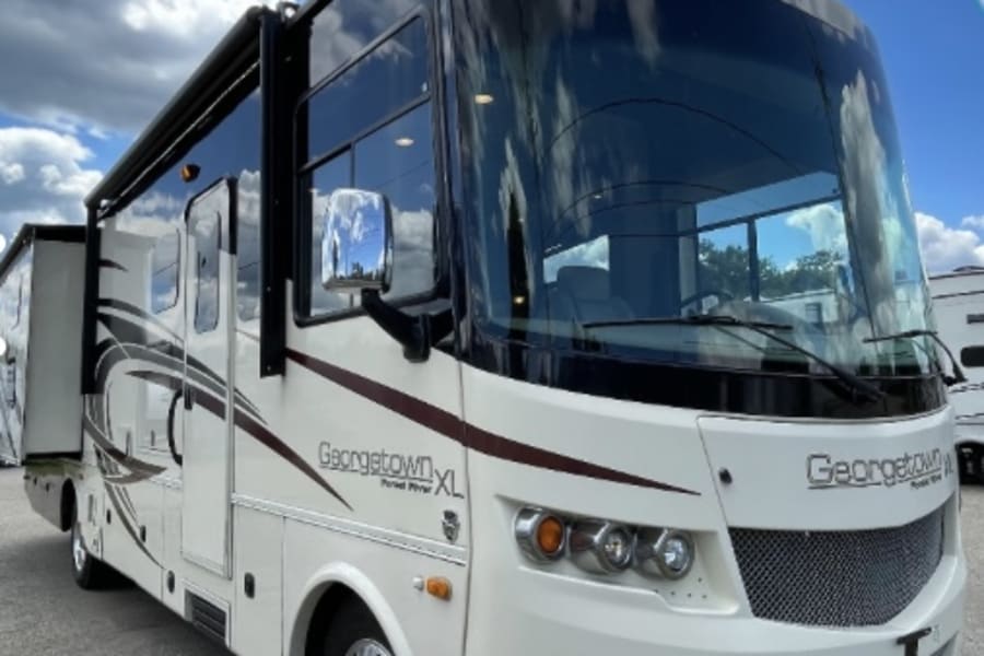 Spacious cream Georgetown XL Class A RV, ready for an rv rental adventure.