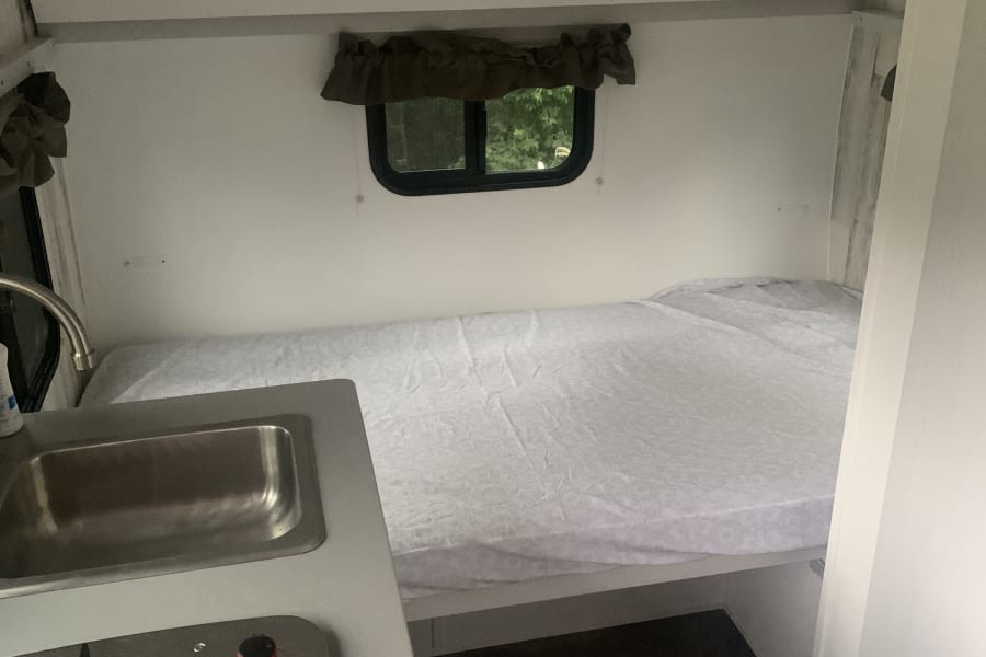 Smaller bed with bunk above (150 lbs max on bunk)