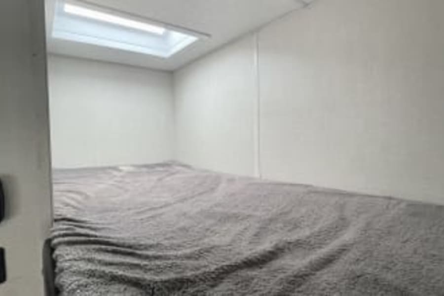 top bunk with sky light