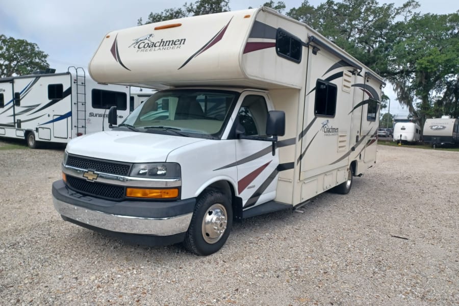 White Coachmen Freelander Class C motorhome for rv rental, ready for camping and travel adventures.