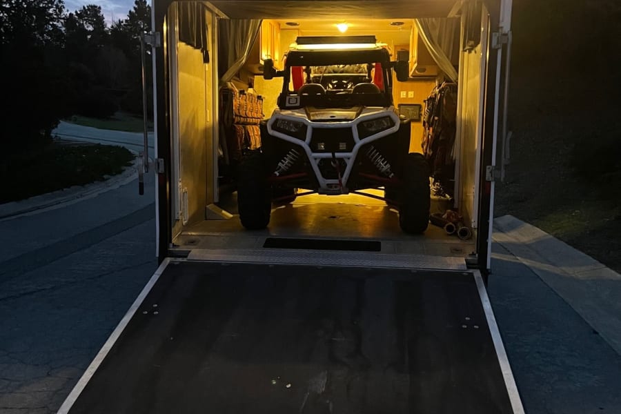 this photo has the lower rear bunk removed to fit the rzr