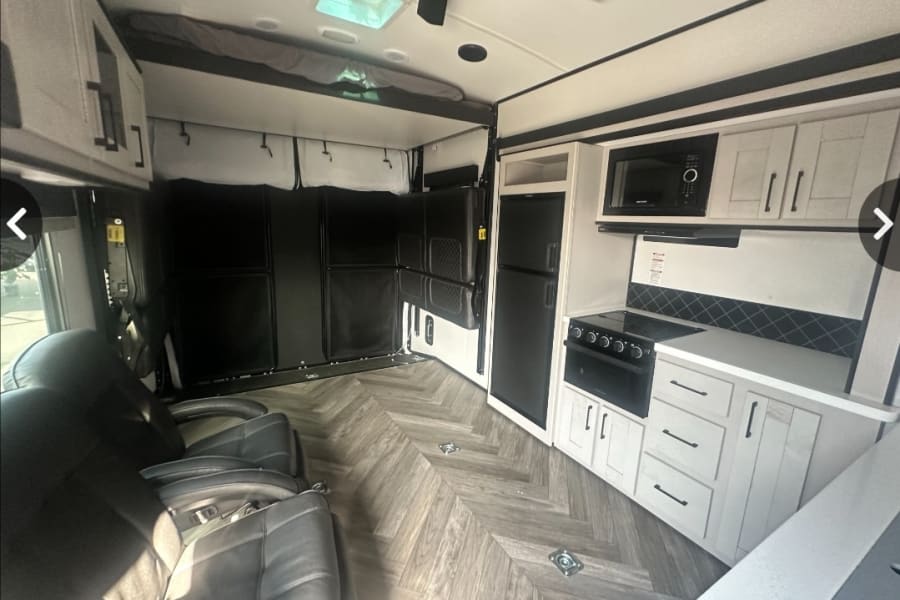 Living room with bunks tucked away