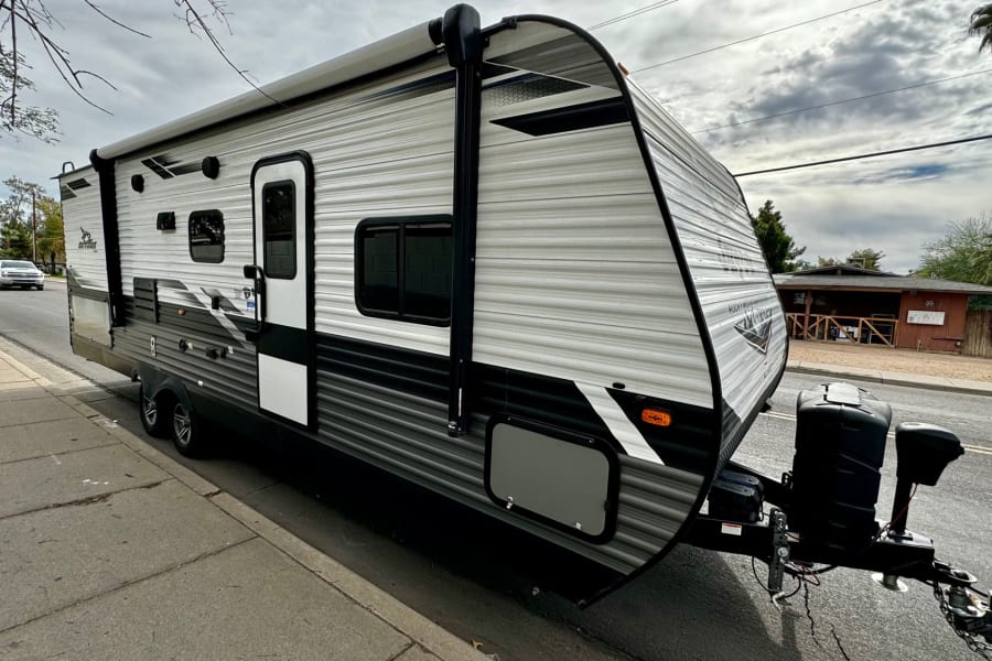 Jayco travel trailer (RV) on the street, ready for your next rv rental journey.