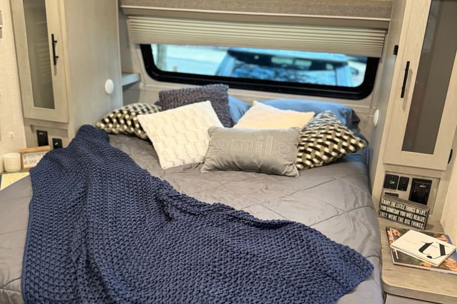 Queen Sized mattress with a Tempur-Pedic mattress topper.  Not pictured is the sofa underneath when the bed is folded up.