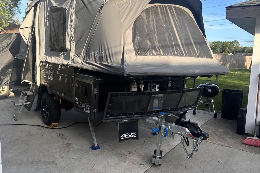 Explore with this unique Opus Off-Road pop-up RV rental, fully set up for adventure and camping!