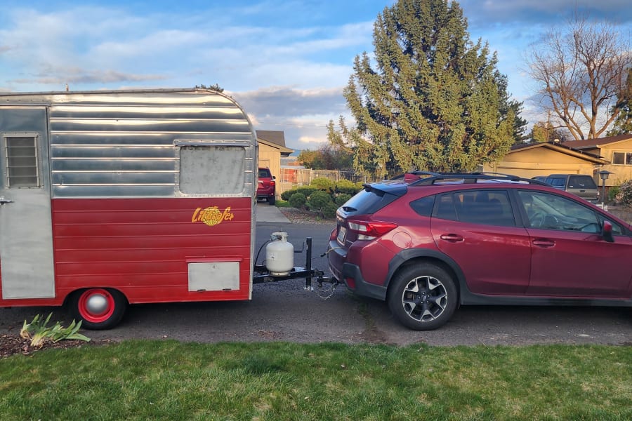 This Lil Loafer is lightweight and easy to tow behind almost any car. We tow it with our Subaru Crosstrek... which is a small car as you can see here. It's also easy to back into campsites or tow into festivals without being too crowded.