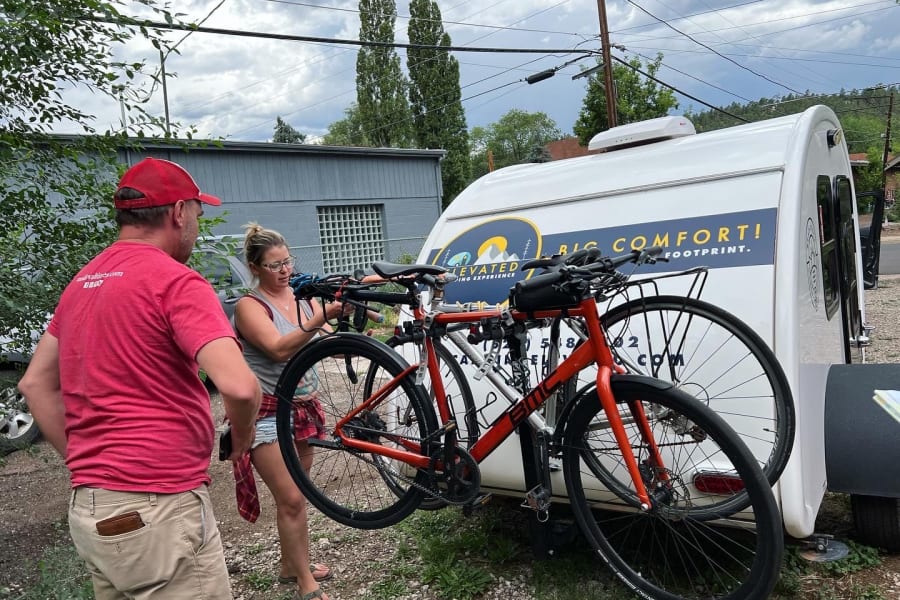 Holds up to two bikes! (We have bike racks available!)