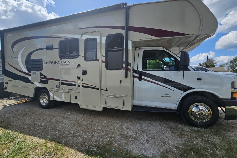 This beige & white Coachmen Leprechaun RV is ready for your next rv rental adventure!